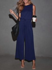 Milan Kiss Kombinezon w kolorze granatowym rozmiar: XL. Niebieskie kombinezony damskie Milan Kiss, xl, bez wzorów, bez kołnierzyka, bez ramiączek. Za 195.99 zł.