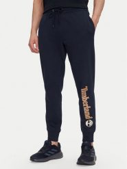 Timberland Spodnie dresowe TB0A5YFB Granatowy Regular Fit. Niebieskie spodnie dresowe męskie Timberland, bez wzorów, z bawełny. Za 219.99 zł.