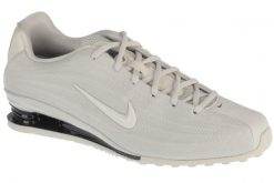 Buty sportowe Sneakersy damskie, Shox Z. Brązowe buty sportowe na co dzień damskie Nike, bez wzorów, z materiału, trekkingowe. Za 499.99 zł.