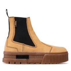 Sztyblety Puma. Żółte botki damskie Puma, bez obcasa, na płaskiej podeszwie, bez zapięcia. Za 409.99 zł.