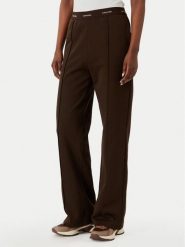 Calvin Klein Jeans Spodnie dresowe LV047G253G Brązowy ciemny Relaxed Fit. Brązowe jeansy damskie Calvin Klein Jeans, xs, bez wzorów, z bawełny. Za 409.99 zł.