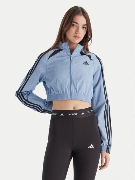 Adidas Bluza Teamgeist adicolor JZ8277 Błękitny Slim Fit. Niebieskie bluzy bez kaptura damskie Adidas, l, z syntetyku. Za 219.99 zł.