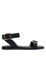 BOSS Sandały Charlize 50563332 Czarny. Czarne sandały damskie Boss, bez wzorów, ze skóry, bez obcasa, na płaskiej podeszwie. Za 899.99 zł.