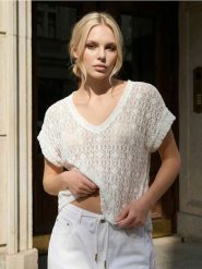 Ażurowa koszulka z krótkim rękawem z bawełną - kremowy. Białe t-shirty damskie Sinsay, l, w ażurowe wzory, z bawełny, bez kołnierzyka. Za 29.99 zł.