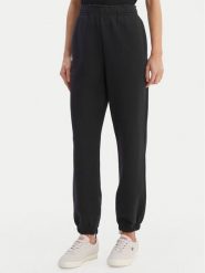 Lacoste Spodnie dresowe XF5244 Granatowy Regular Fit. Niebieskie spodnie dresowe damskie Lacoste, bez wzorów, z dresówki. Za 609.99 zł.