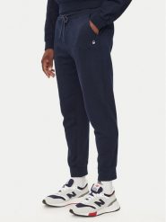 United Colors Of Benetton Spodnie dresowe 342ZUF01B Granatowy Regular Fit. Niebieskie spodnie dresowe męskie United Colors Of Benetton, bez wzorów, z bawełny. Za 129.99 zł.