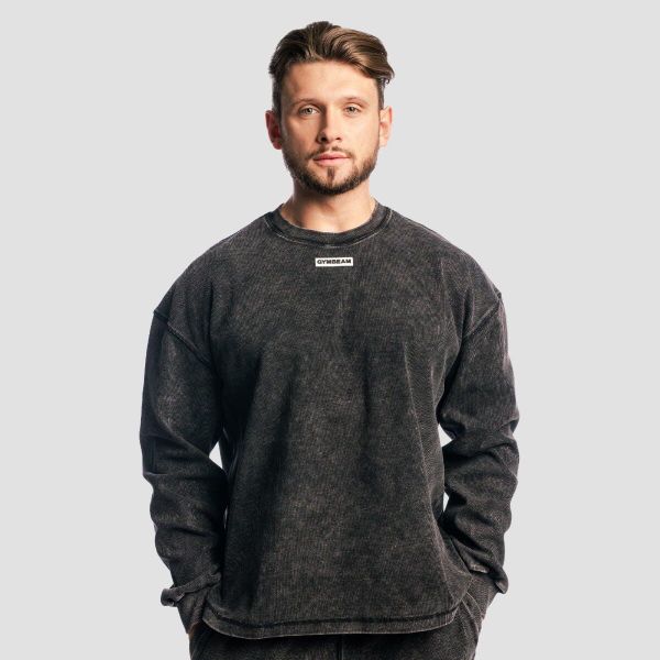 Bluza męska oversize z efektem sprania Aura Washed. Czarne bluzy sportowe męskie GYMBEAM, bez wzorów, z bawełny, bez kołnierzyka, bez ramiączek. Za 131.90 zł.