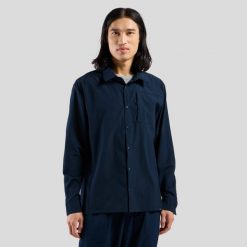 Koszula męska Odlo ESSENTIAL Shirt l/s. Niebieskie koszule męskie Odlo, na lato, l, bez wzorów, z materiału, bez kołnierzyka, bez ramiączek. Za 429.99 zł.