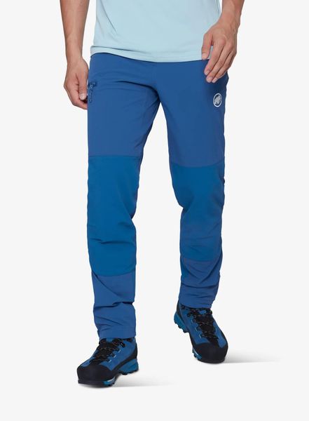 Spodnie softshell męskie Mammut Courmayeur SO Pants. Niebieskie spodnie materiałowe męskie Mammut, bez wzorów, z elastanu, biznesowe. Za 989.99 zł.