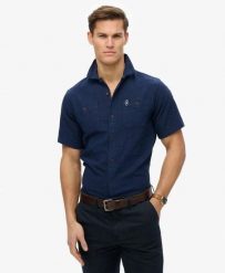 Superdry Koszula krótki rękaw The Merchant Store o fakturze. Niebieskie koszule damskie Superdry., l, bez wzorów, z bawełny, bez kołnierzyka, bez ramiączek. Za 344.20 zł.