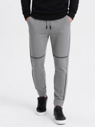 Spodnie męskie dresowe z kontrastowymi przeszyciami - szare V2. Szare spodnie dresowe męskie Ombre Clothing, bez wzorów, z bawełny. W wyprzedaży za 69.99 zł.