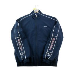 Second life - Kurtka dresowa męska Y2K - Stan dobry. Niebieskie kurtki treningowe męskie Reebok, l, bez wzorów, z dresówki. Za 190.96 zł.