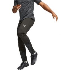 Spodnie męskie Puma Teamcup Pant. Czarne spodnie sportowe męskie Puma, z materiału. Za 290.00 zł.