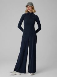 4F Spodnie dresowe z szerokimi nogawkami damskie - granatowe XL. Niebieskie spodnie dresowe damskie 4f, l, bez wzorów, z dresówki. Za 169.99 zł.