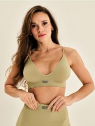 Biustonosz sportowy w prążek - zielony. Zielone biustonosze sportowe damskie Sinsay, bez wzorów. Za 25.99 zł.