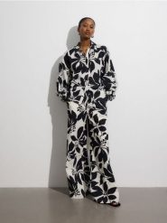 Bawełniana koszula ze wzorem - wielobarwny. Koszule damskie Reserved, l, bez wzorów, z bawełny, bez kołnierzyka, bez ramiączek. W wyprzedaży za 69.99 zł.