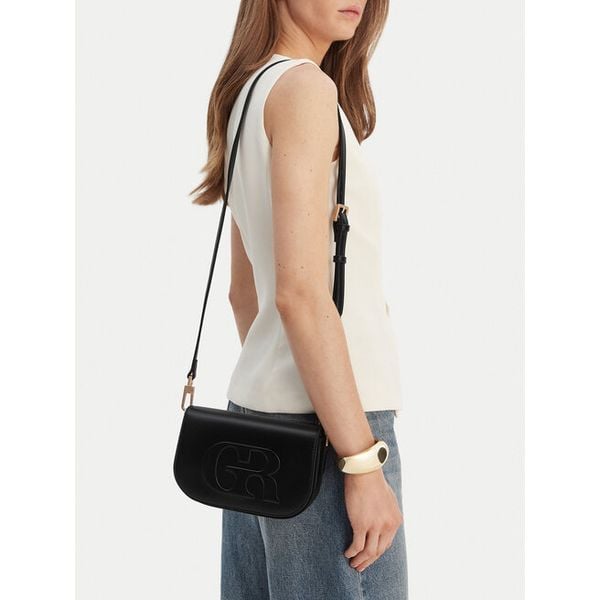 Torebka GINO ROSSI. Czarne listonoszki damskie Gino Rossi, bez wzorów, bez dodatków. Za 179.99 zł.