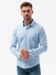 Koszula męska dzianinowa z długim rękawem - niebieska V3. Niebieskie koszule męskie Ombre Clothing, m, bez wzorów, z dzianiny, bez kołnierzyka, bez ramiączek. W wyprzedaży za 39.99 zł.