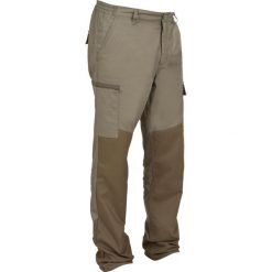 Spodnie outdoor renfort 100. Brązowe spodnie materiałowe męskie SOLOGNAC, bez wzorów, z bawełny, sportowe. Za 129.99 zł.