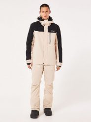 Oakley Kurtka narciarska "TNP" w kolorze beżowo-czarnym rozmiar: S. Brązowe kurtki narciarskie i snowboardowe damskie Oakley, s, bez wzorów, bez kaptura. Za 383.03 zł.