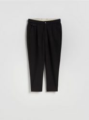 Spodnie chino regular fit - czarny. Czarne spodnie materiałowe męskie Reserved, bez wzorów, z bawełny. Za 129.99 zł.