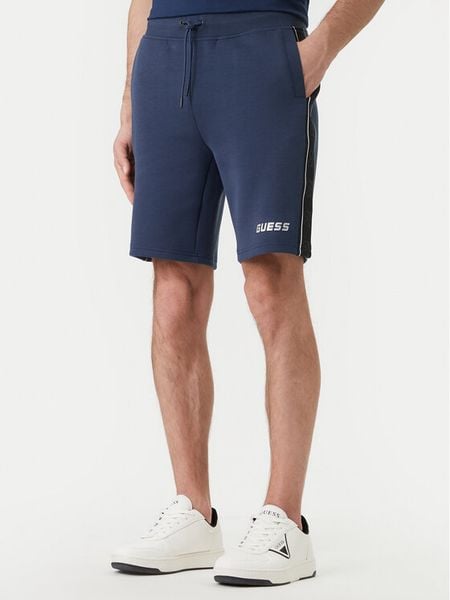 Guess Szorty sportowe Z4RD04 KB3P2 Granatowy Regular Fit. Niebieskie szorty męskie Guess, m, z syntetyku. Za 329.99 zł.