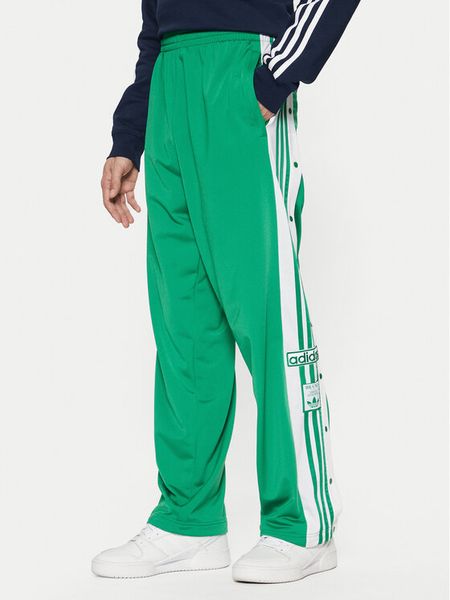 Adidas Spodnie dresowe Adibreak JP3762 Zielony Regular Fit. Zielone spodnie dresowe męskie Adidas, bez wzorów, z dresówki. Za 279.99 zł.