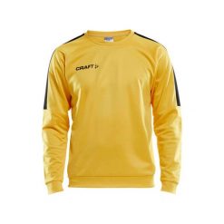 Bluza z okrągłym dekoltem Craft progress r-neck. Żółte bluzy sportowe męskie Craft, bez wzorów, bez kołnierzyka, bez ramiączek. Za 179.95 zł.