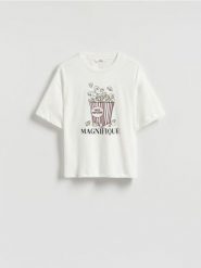 T-shirt oversize z nadrukiem - złamana biel. T-shirty damskie Reserved, l, bez wzorów, z bawełny, bez kołnierzyka. W wyprzedaży za 39.99 zł.