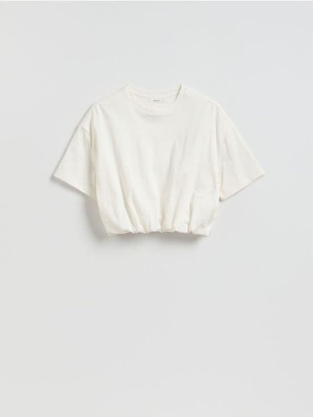 Krótki t-shirt z marszczeniem - złamana biel. T-shirty damskie Reserved, l, bez wzorów, z bawełny, bez kołnierzyka. Za 49.99 zł.