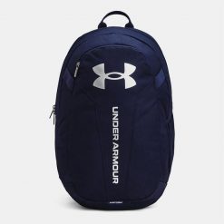 Plecak miejski UNDER ARMOUR Hustle Lite Backpack 24L. Niebieskie plecaki damskie Under Armour, bez wzorów, sportowe. W wyprzedaży za 95.00 zł.