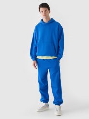 4F Spodnie dresowe oversize męskie - niebieskie 3XL. Niebieskie spodnie dresowe męskie 4f, bez wzorów, z bawełny. W wyprzedaży za 79.99 zł.