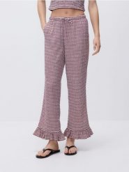 Spodnie z falbanką - bordowy. Czerwone spodnie materiałowe damskie Reserved, bez wzorów, z dzianiny. Za 89.99 zł.