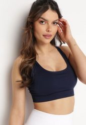 Granatowy Biustonosz Sportowy Usztywniony ze Skrzyżowanymi Ramiączkami Edorlia. Niebieskie biustonosze sportowe damskie Born2be, bez wzorów. Za 39.99 zł.