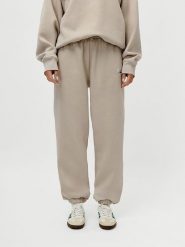 LeGer Spodnie dresowe "Maxime" w kolorze beżowym rozmiar: 40. Brązowe spodnie dresowe damskie LeGer, bez wzorów, z dresówki. Za 100.99 zł.