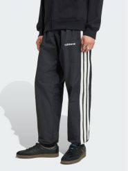 Adidas Spodnie dresowe Cutline Track KW8023 Czarny Regular Fit. Czarne spodnie dresowe męskie Adidas, bez wzorów, z dresówki. Za 328.99 zł.