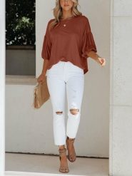 Milan Kiss Bluzka w kolorze jasnobrązowym rozmiar: L. Brązowe bluzki damskie Milan Kiss, l, bez wzorów, bez kołnierzyka, bez ramiączek. Za 141.95 zł.