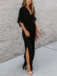 Milan Kiss Sukienka w kolorze czarnym rozmiar: XL. Czarne sukienki damskie Milan Kiss, na imprezę, xl, bez wzorów, bez kołnierzyka, bez ramiączek, maxi. Za 161.73 zł.