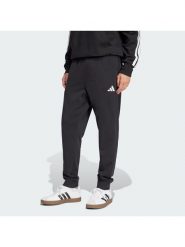 Adidas Spodnie dresowe Essentials Feel Cozy JE3854 Czarny Regular Fit. Czarne spodnie dresowe męskie Adidas, bez wzorów, z bawełny. Za 218.99 zł.