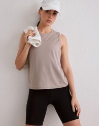 Damski top biegowy bezszwowy, szybkoschnący, przewiewny, luźny Le Run ciemny beż. Brązowe topy sportowe damskie Aim'n, m, bez wzorów, z dzianiny, bez ramiączek. Za 170.00 zł.
