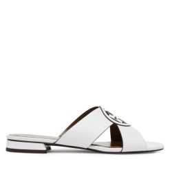 Klapki Tory Burch. Białe klapki damskie Tory Burch, bez wzorów, bez obcasa. Za 809.99 zł.