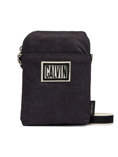 Calvin Klein Saszetka Ssnl Graphic Reporter LV04D3627G Czarny. Czarne saszetki męskie CALVIN KLEIN, z materiału. Za 289.99 zł.
