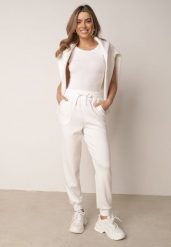 Białe Spodnie Dresowe Joggery z Wysokim Stanem i Ściągaczami przy Kostkach Janlea. Białe spodnie dresowe damskie Born2be, l, bez wzorów, z dresówki. Za 89.99 zł.