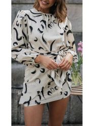 Milan Kiss Sukienka w kolorze kremowo-czarnym rozmiar: S. Brązowe sukienki damskie Milan Kiss, na imprezę, s, bez wzorów, z wiskozy, bez kołnierzyka, bez ramiączek, mini. Za 165.99 zł.