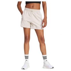 Damskie szorty tkane adidas Essentials 3-Stripes. Brązowe szorty damskie Adidas, bez wzorów, z materiału, sportowe. Za 151.30 zł.