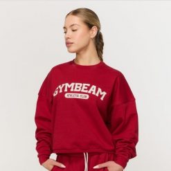 Bluza damska fitness bez kaptura czerwona Varsity. Czerwone bluzy sportowe damskie GYMBEAM, m, z bawełny. Za 139.90 zł.