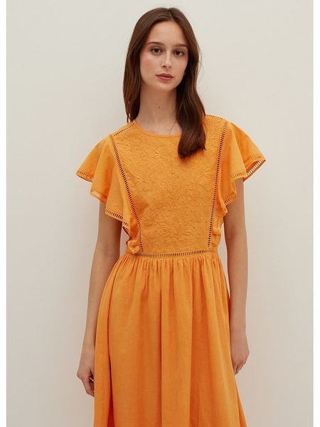 STEFANEL Sukienka w kolorze pomarańczowym rozmiar: 42. Pomarańczowe sukienki damskie Stefanel, bez wzorów, z bawełny, bez kołnierzyka, bez ramiączek, midi. Za 161.34 zł.