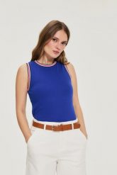 Bawełniany top niebieski. Niebieskie topy damskie MOODO, l, bez wzorów, z bawełny, bez kołnierzyka. Za 49.99 zł.