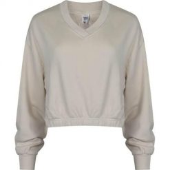 Bluza sportowa damska Reebok HS4737. Białe bluzy bez kaptura damskie Reebok, s, bez wzorów, z bawełny, bez ramiączek, krótkie, bez kaptura. Za 171.00 zł.