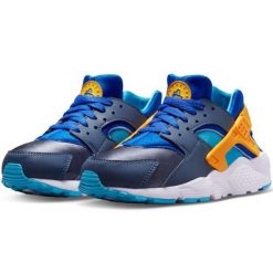 Buty Nike Air Huarache Run 654275 422 niebieskie. Niebieskie buty sportowe na co dzień damskie bez wzorów, z materiału. Za 491.47 zł.